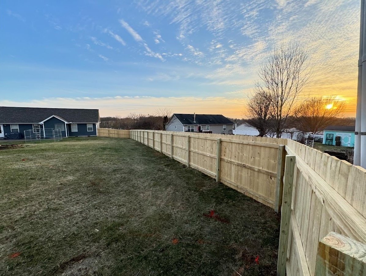 Wood privacy fence along a residential property