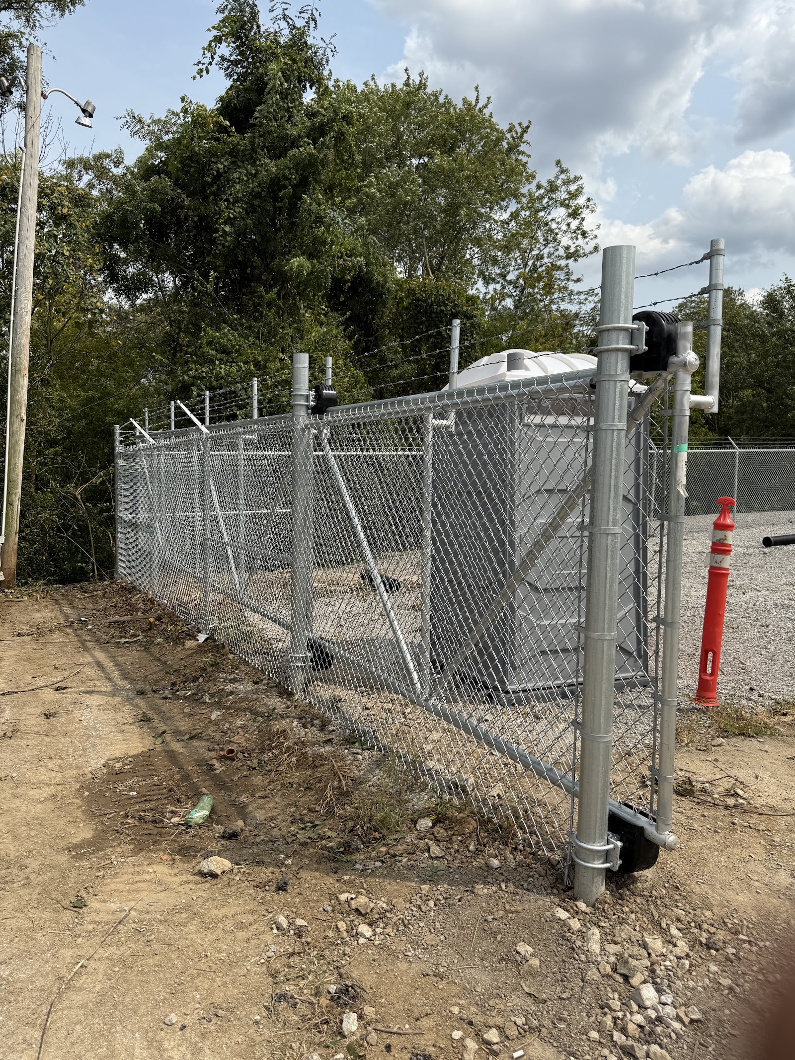 Chain link enclosure and entry gate